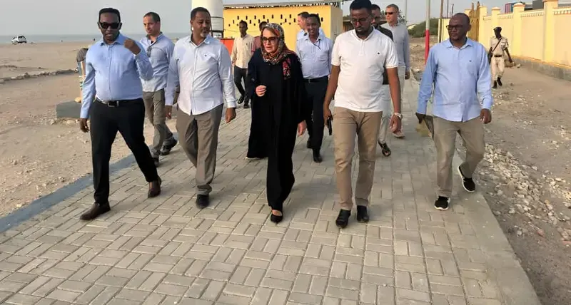 The European Union Ambassador to Somalia, Tiina Intelmann, (middle) is escorted around the Berbera beachfront by a team from UN-Habitat and a team from the Berbera Municipality led by Abdishakur Mohamoud Hassan, the Mayor of Berbera on 9th August 2023 . © Idiris Mahamoud