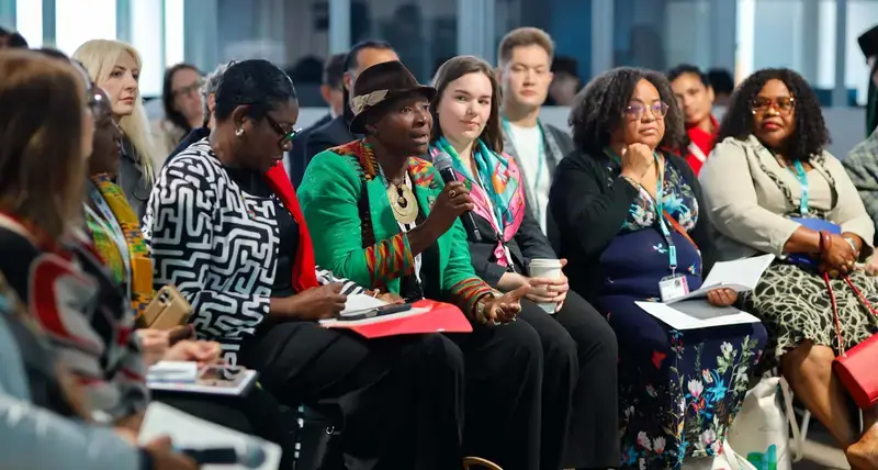 A stakeholder shares her perspective during the Women’s Caucus meeting at WUF13. © UN-Habitat