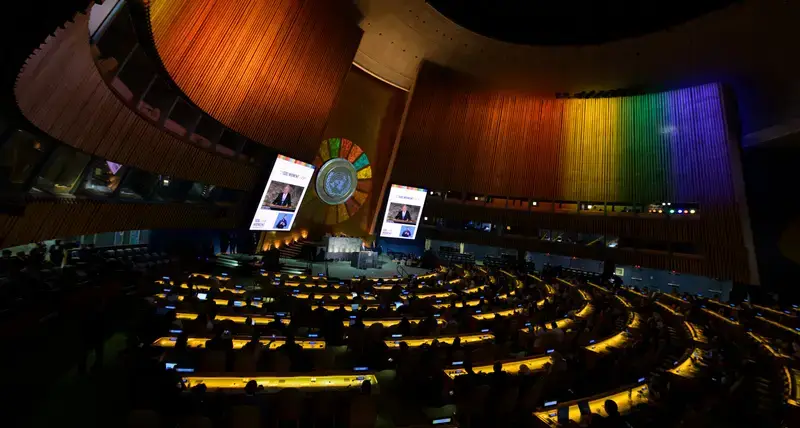 A wide view of the General Assembly Hall as Secretary-General António Guterres (at podium and on screens) addresses the SDG Moment 2026. © UN Photo/Manuel Elías